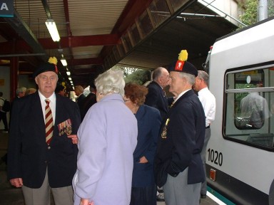 Admiring Frank Seddon's medals.